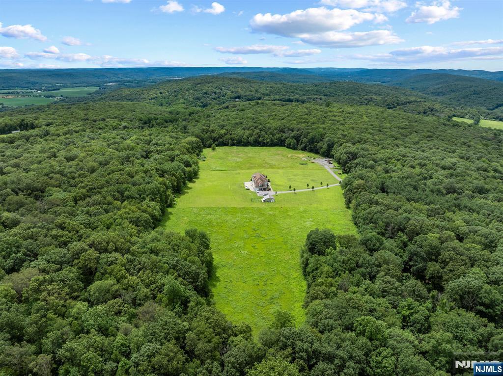 464 Mt Bethel Road Oxford, NJ 07863 - Photo 15 of 31 a view of a green field with an ocean view