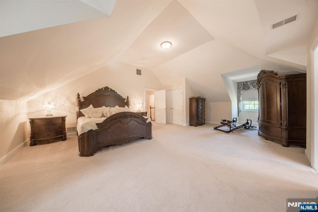 464 Mt Bethel Road Oxford, NJ 07863 - Photo 28 of 31 a bed room with furniture and a flat tv screen