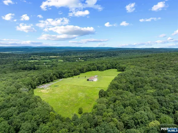 a view of a lake with a big yard