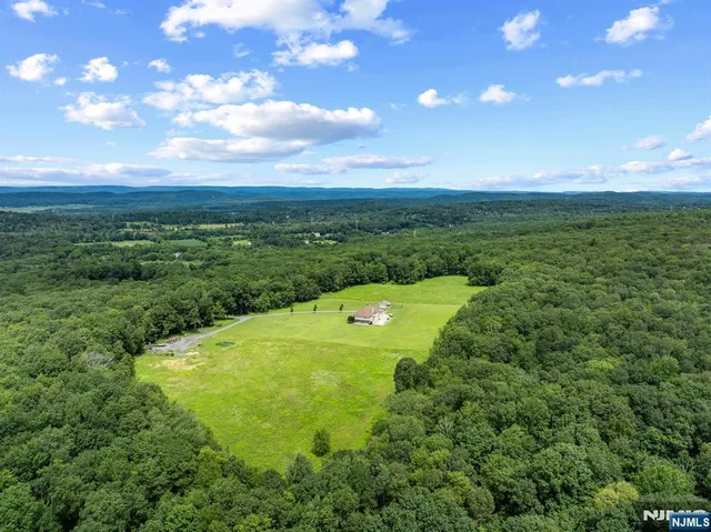 a view of a lake with a big yard