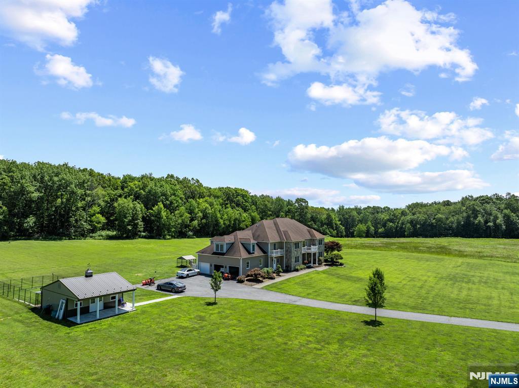 464 Mt Bethel Road Oxford, NJ 07863 - Photo 9 of 31 a view of a garden with lawn chairs
