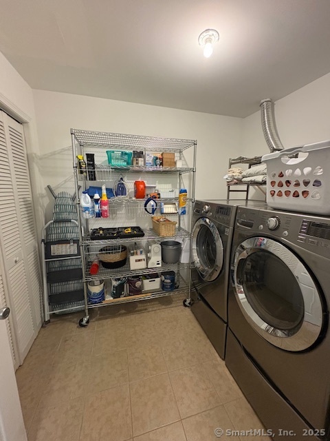 130 Meridian Street, Unit 311 Groton, CT 06340 - Photo 14 of 18 a utility room with lot dryer and washer