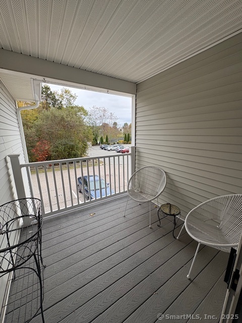 130 Meridian Street, Unit 311 Groton, CT 06340 - Photo 16 of 18 a view of a balcony with chairs