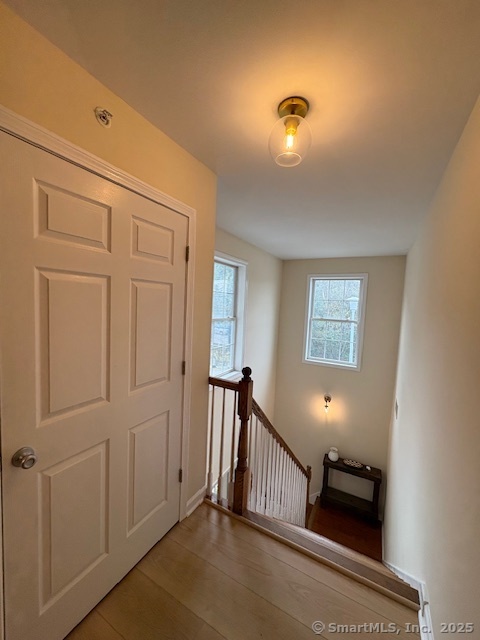 130 Meridian Street, Unit 311 Groton, CT 06340 - Photo 17 of 18 a view of a hallway with windows