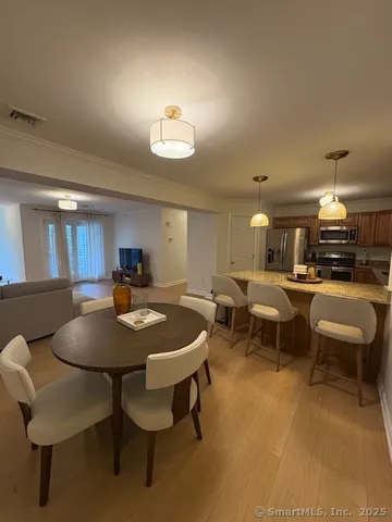 a view of a dining room with furniture