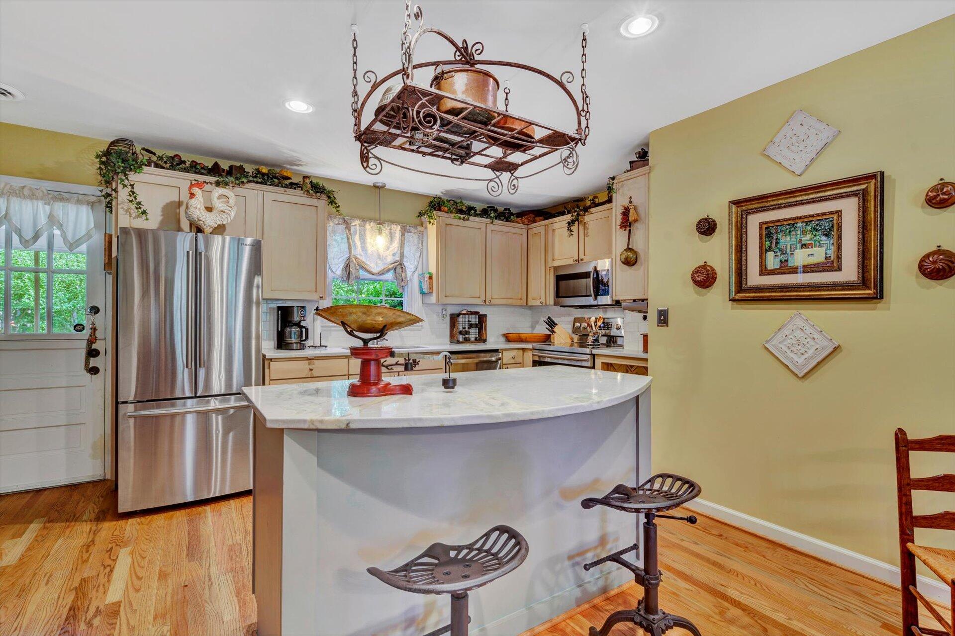 5057 Falcon Ridge Road Roanoke, VA 24018 - Photo 12 of 43 a kitchen with stainless steel appliances a sink and a refrigerator