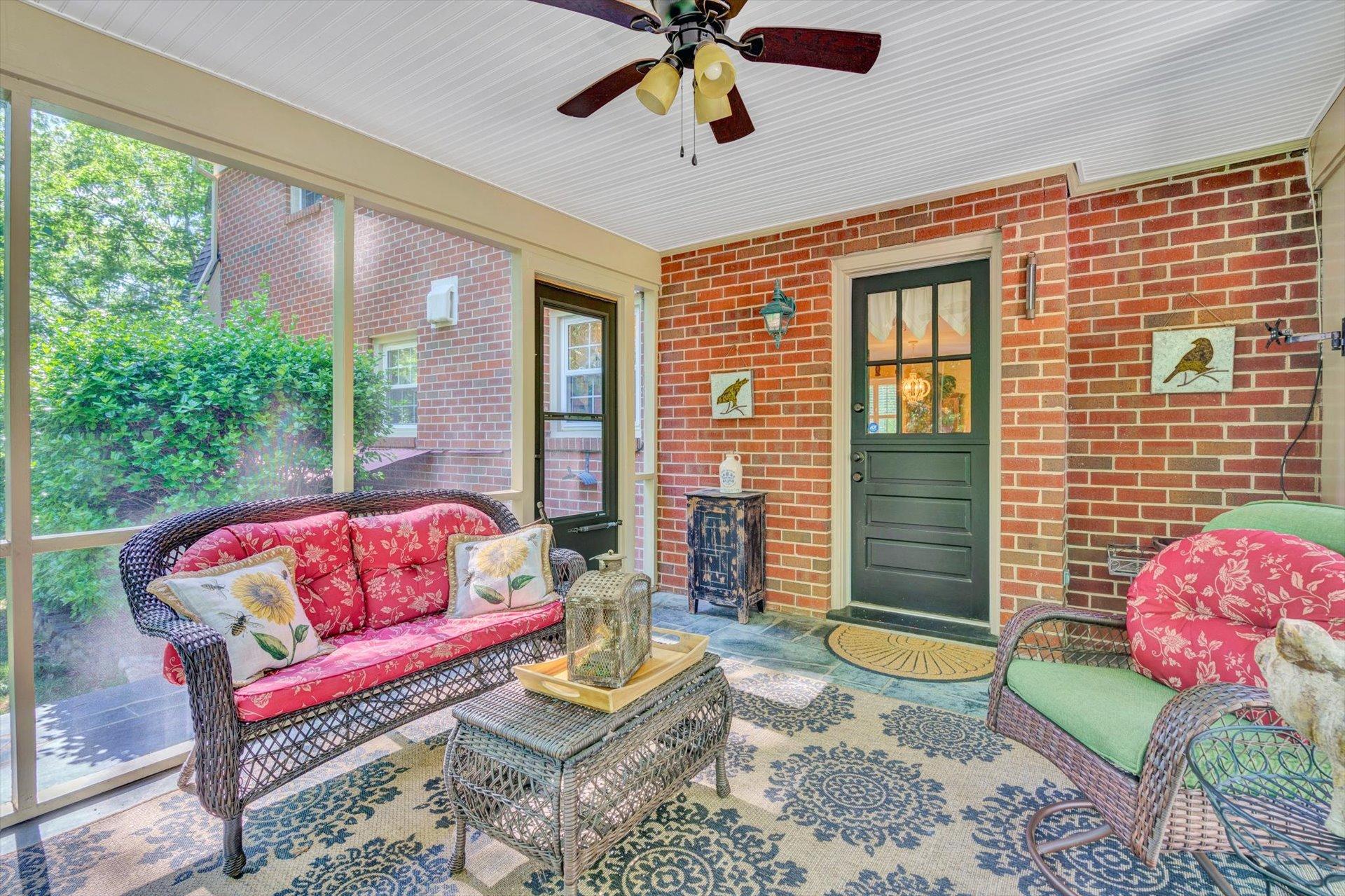 5057 Falcon Ridge Road Roanoke, VA 24018 - Photo 18 of 43 a living room with patio furniture and a potted plant