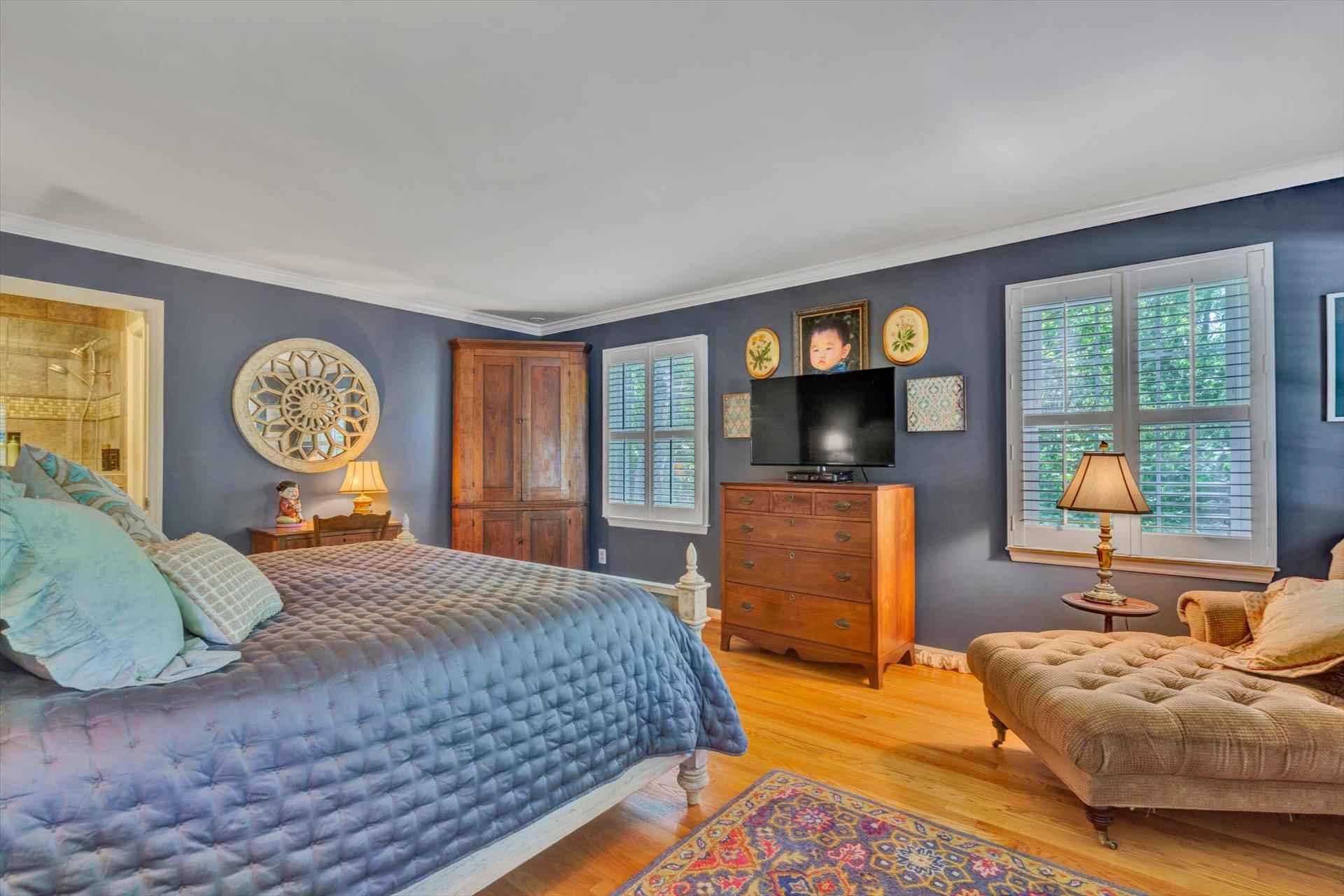 5057 Falcon Ridge Road Roanoke, VA 24018 - Photo 20 of 43 a bedroom with a bed and a tv on dresser
