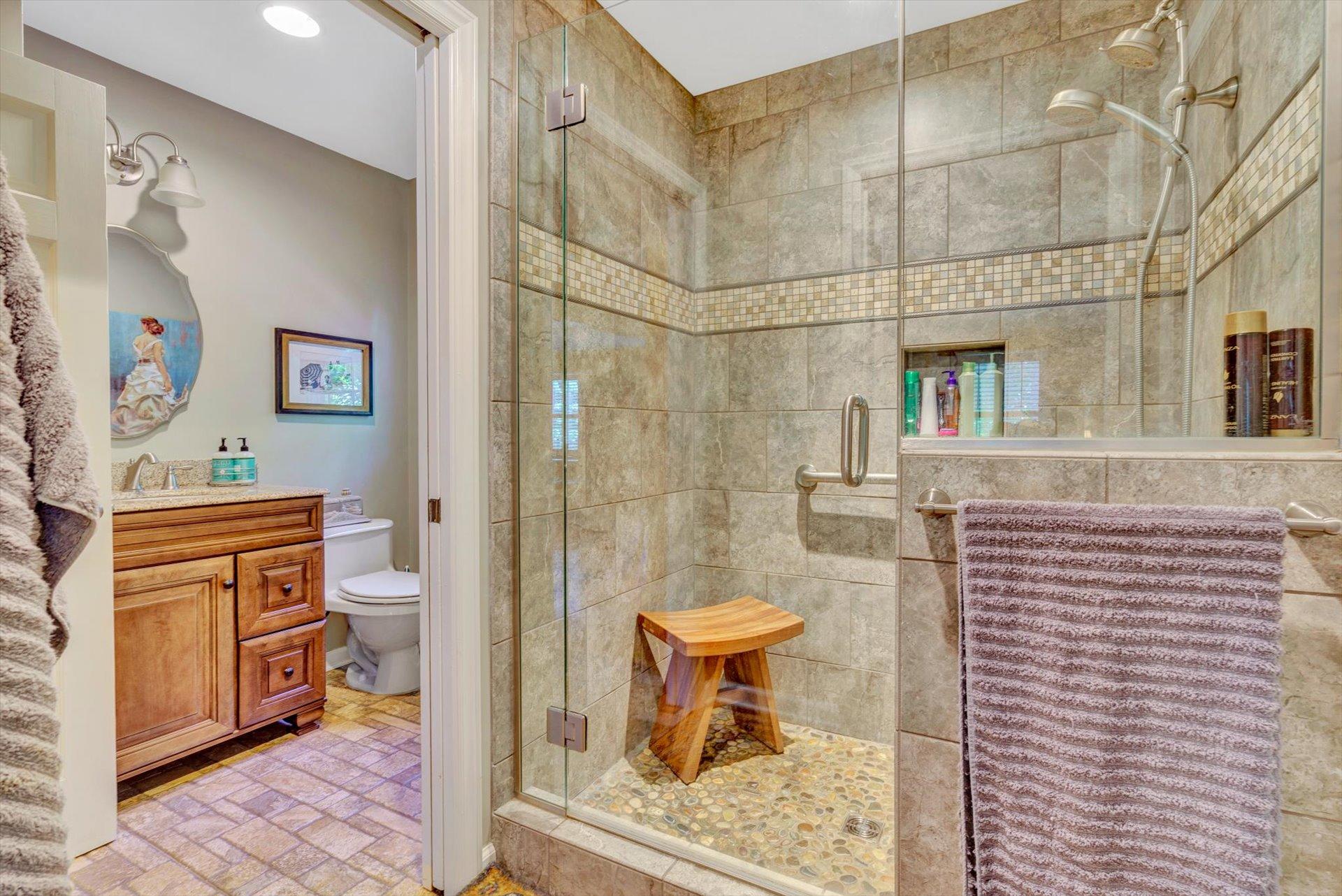 5057 Falcon Ridge Road Roanoke, VA 24018 - Photo 21 of 43 a bathroom with a sink toilet and shower