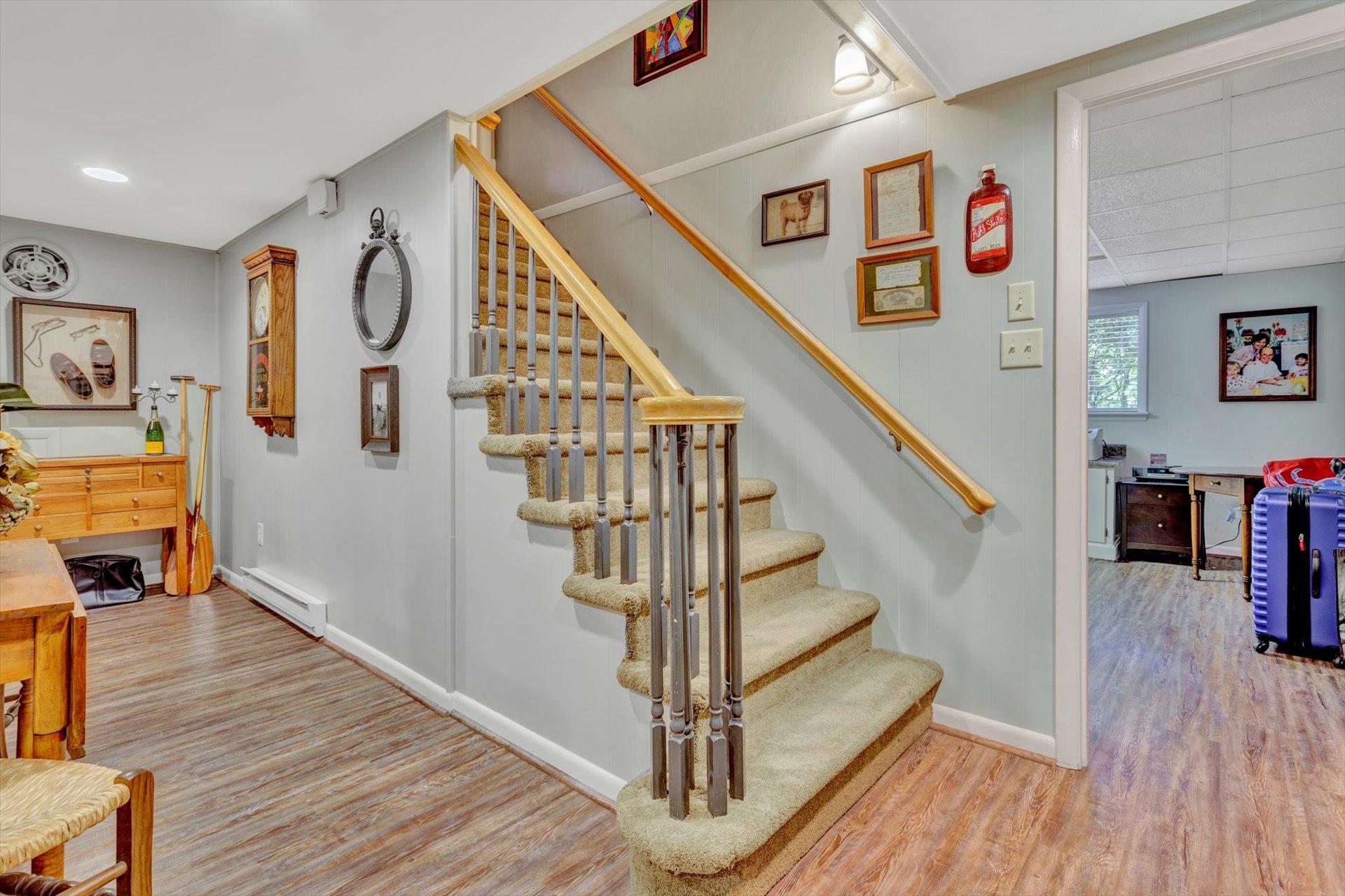 5057 Falcon Ridge Road Roanoke, VA 24018 - Photo 31 of 43 a view of entryway and hall with wooden floor