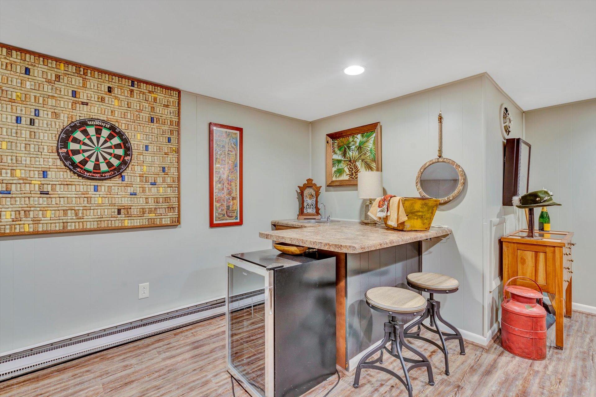 5057 Falcon Ridge Road Roanoke, VA 24018 - Photo 33 of 43 a view of a kitchen area with furniture and wooden floor