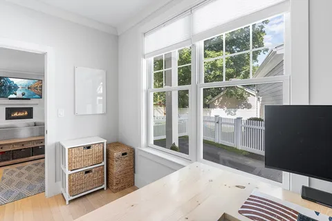 a kitchen with a refrigerator and a stove
