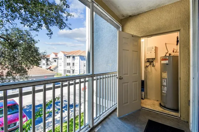 a view of a balcony with wooden floor