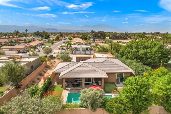 a aerial view of a house with a garden
