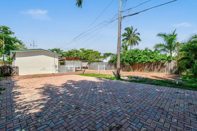 a view of backyard with outdoor space