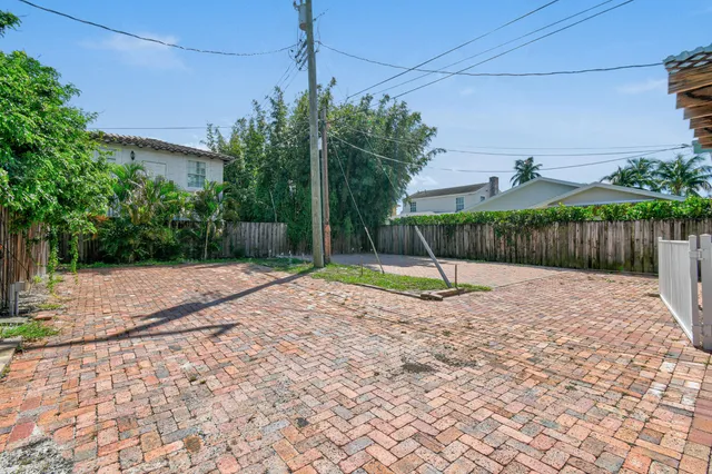 a view of a backyard with a trampoline