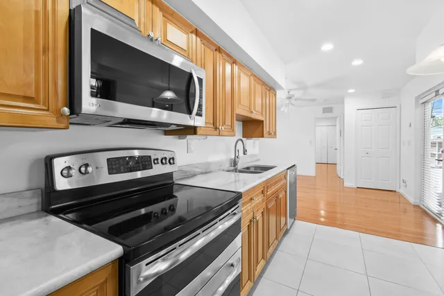 a kitchen with a stove and a microwave