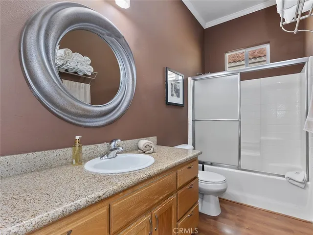 a bathroom with a toilet and a sink