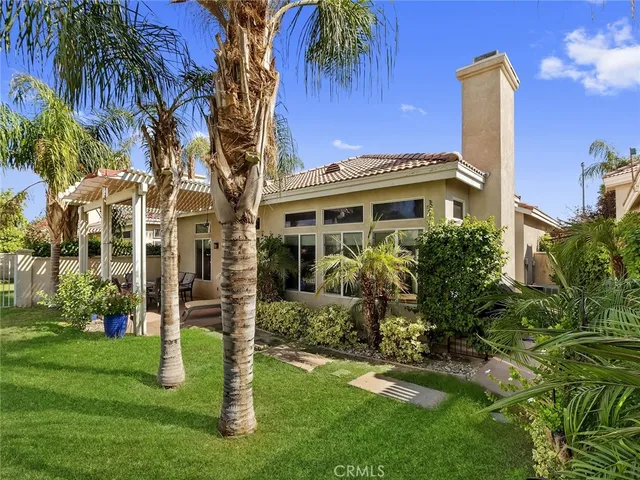 a house view with a garden space