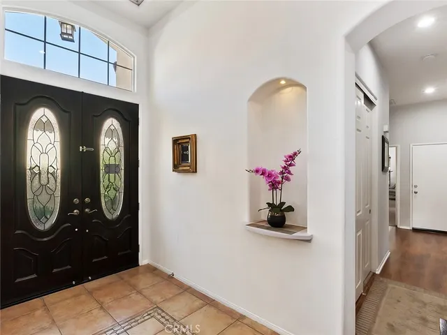 a view of a entryway with wooden floor