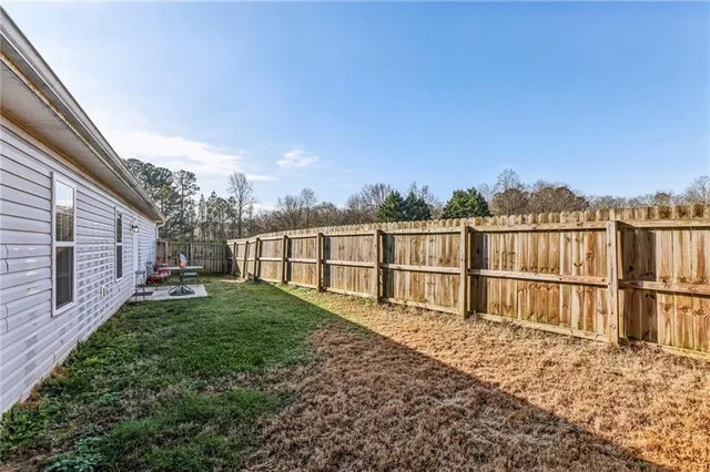 a view of a backyard with a garden