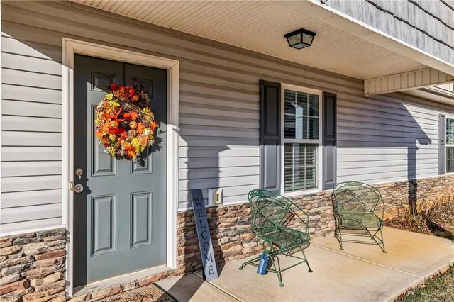 a front view of a house with patio