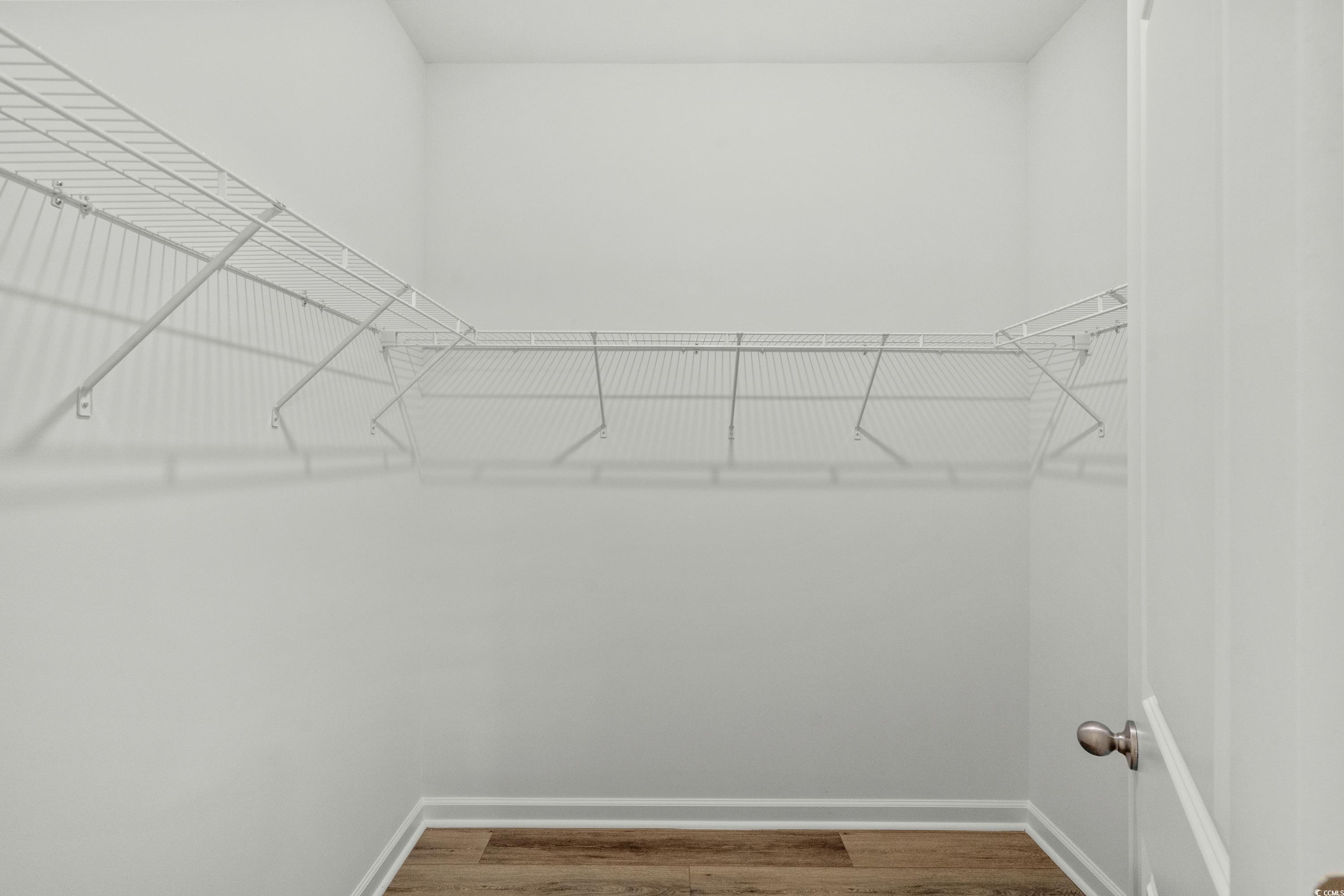 444 Sun Colony Boulevard Longs, SC 29568 - Photo 20 of 31 Spacious closet with LVP.