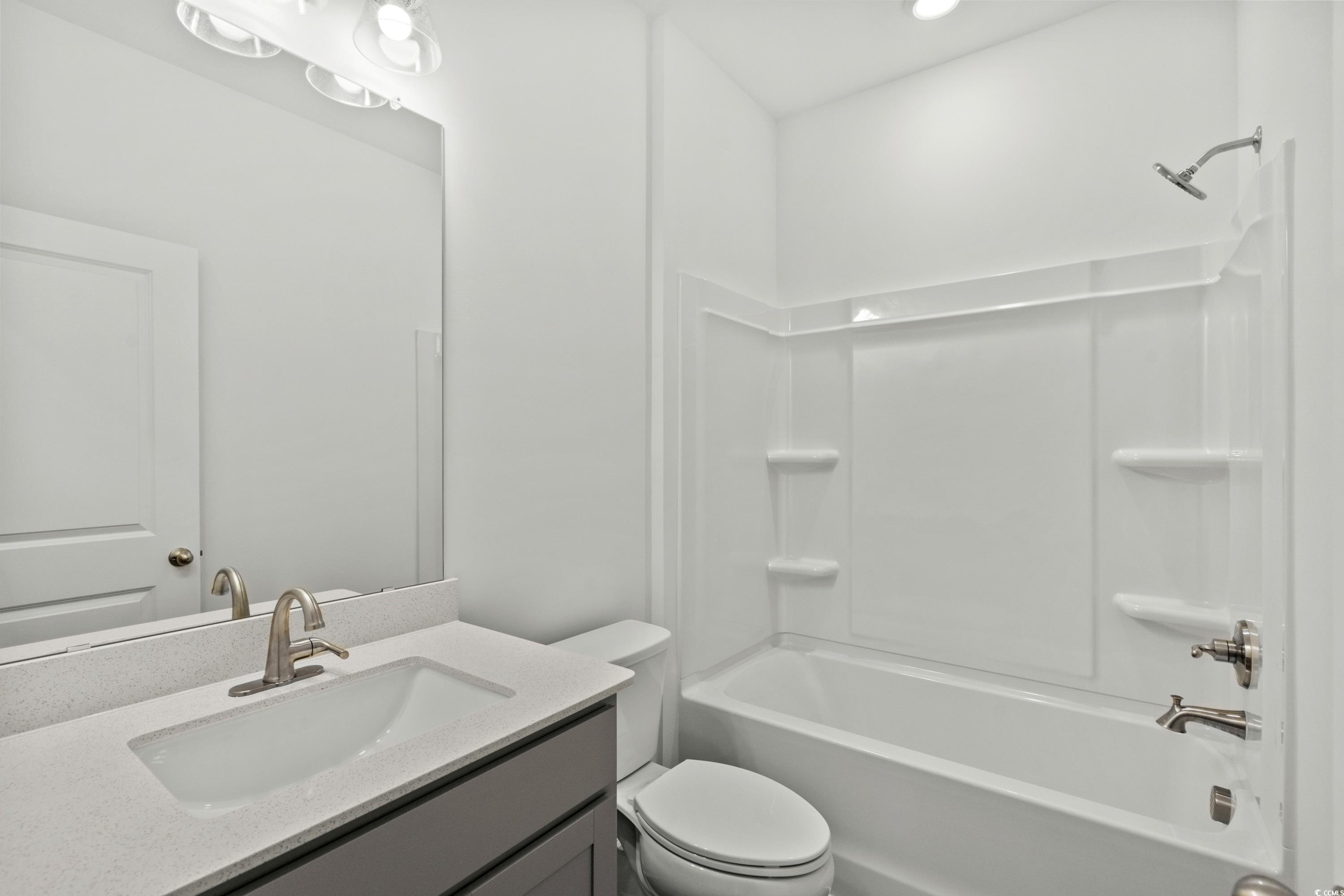 444 Sun Colony Boulevard Longs, SC 29568 - Photo 23 of 31 Full bath with vanity and shower combination