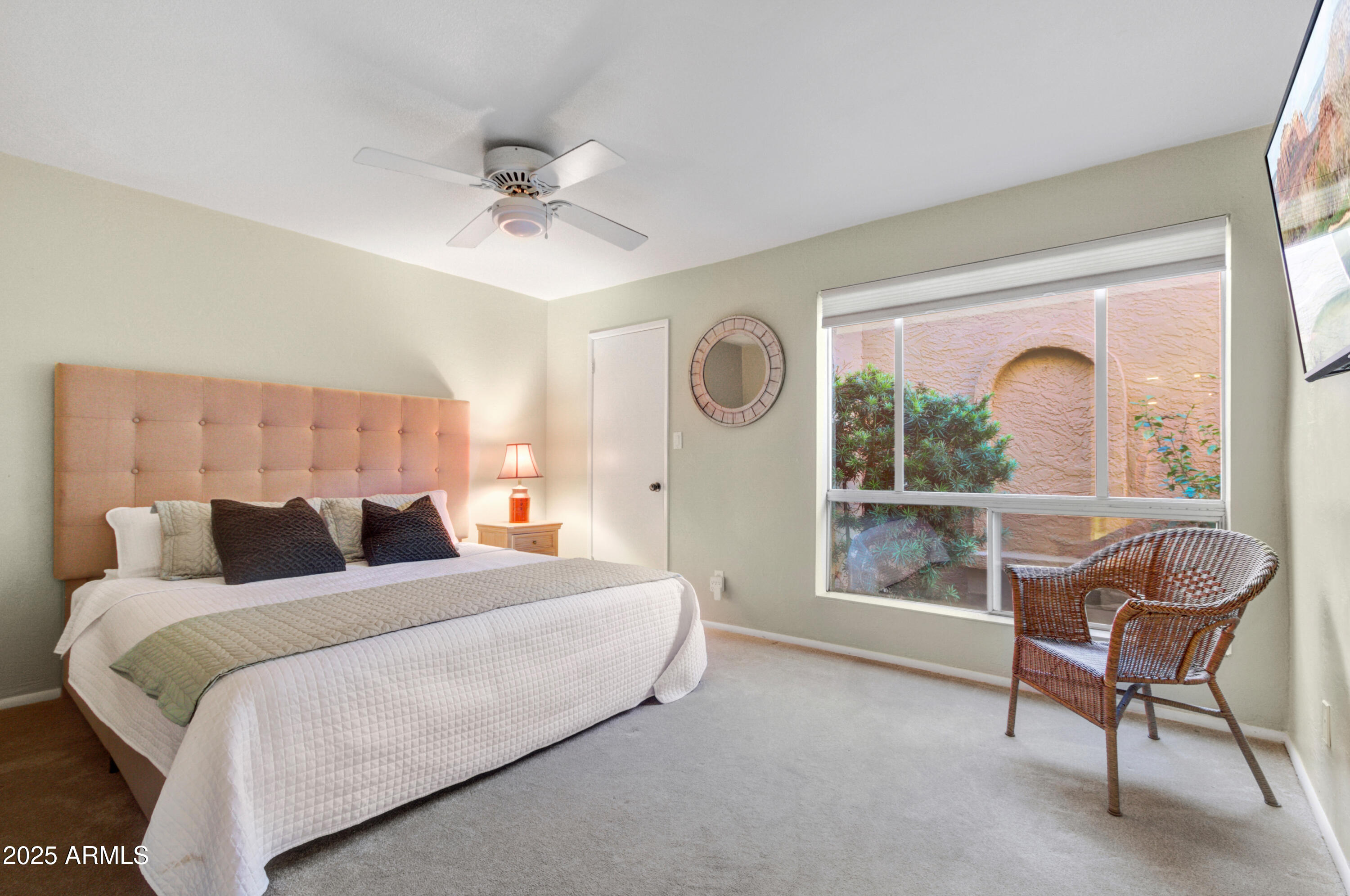 25828 North Primo Circle Rio Verde, AZ 85263 - Photo 10 of 21 a bedroom with a bed and a large window