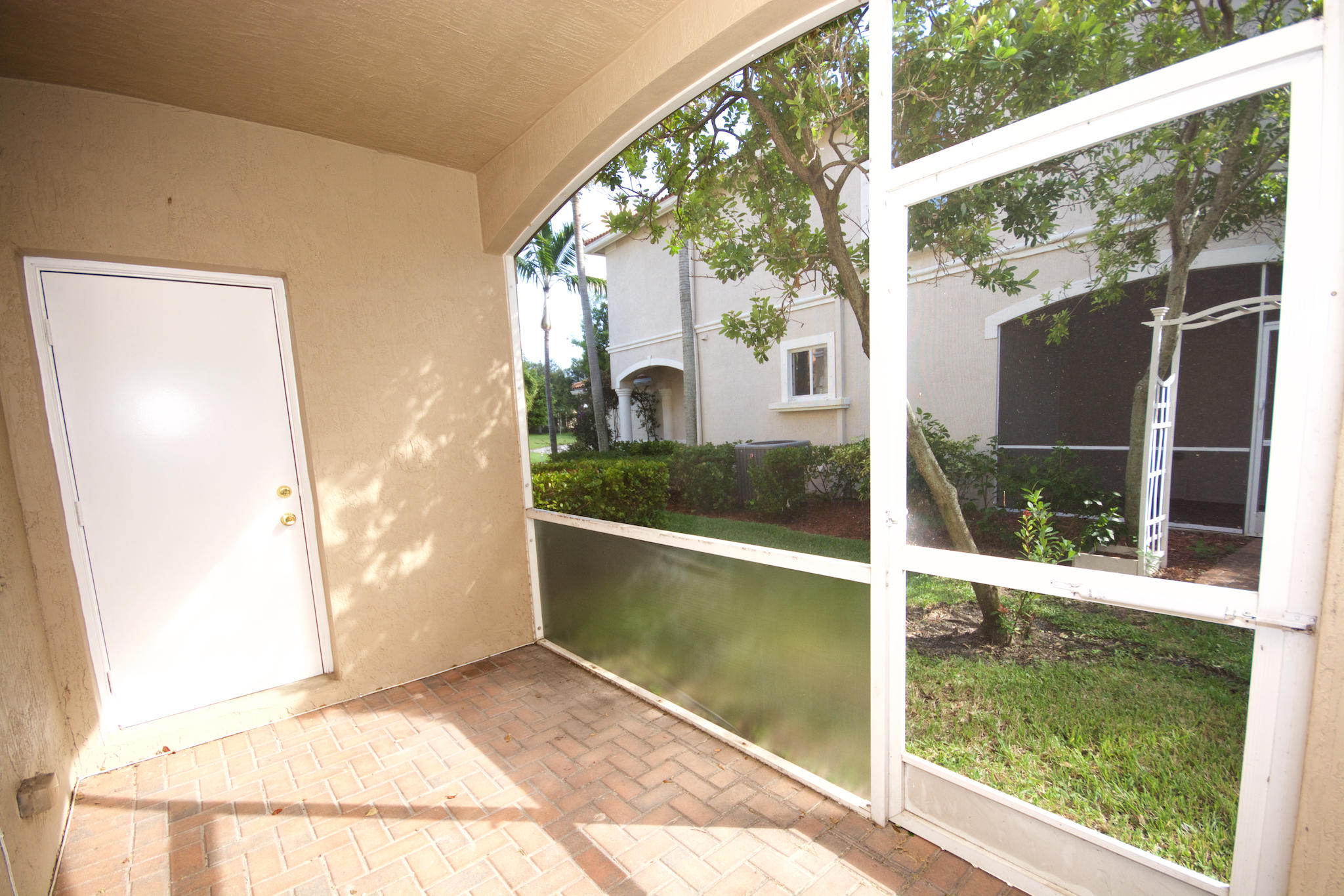 2370 Center Stone Lane Riviera Beach, FL 33404 - Photo 22 of 29 screened porch w storage