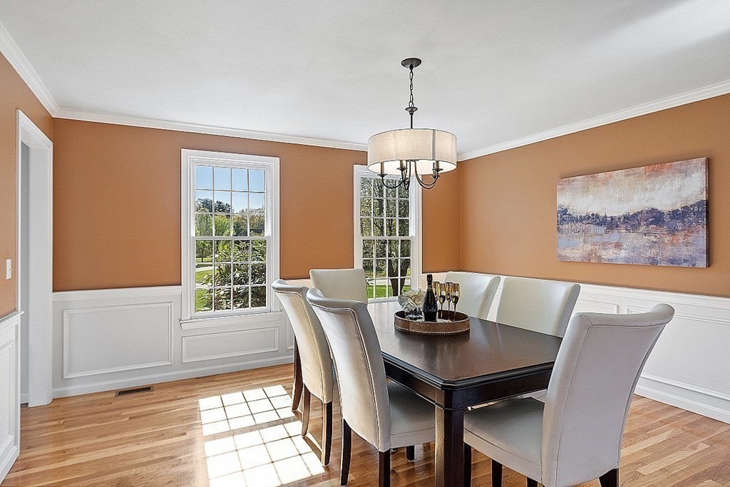 113 Hidden Valley Road Groton, MA 01450 - Photo 14 of 42 a view of a dining room with furniture window and outside view