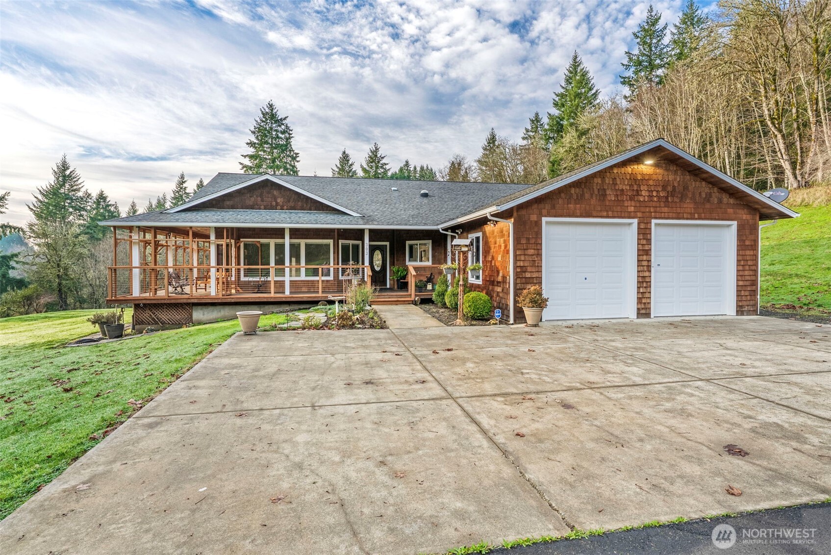 303 Shadow Mountain Road Silverlake, WA 98645 - Photo 2 of 39 a view of a house with a yard