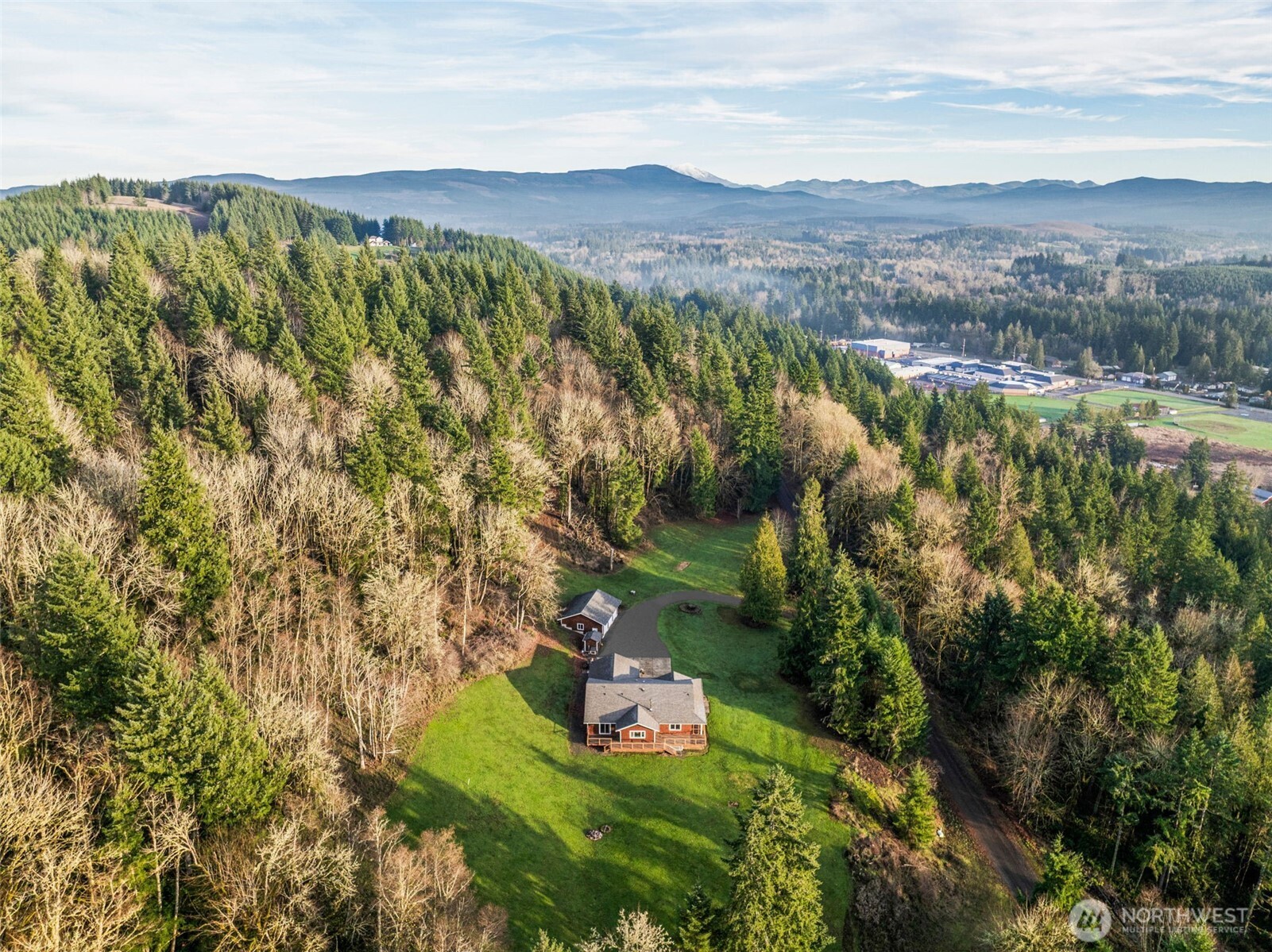 303 Shadow Mountain Road Silverlake, WA 98645 - Photo 25 of 39 a view of a city with lush green forest