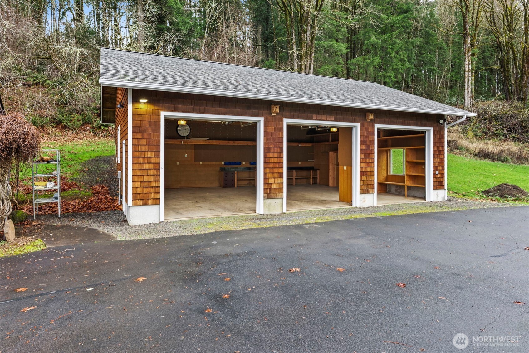 303 Shadow Mountain Road Silverlake, WA 98645 - Photo 33 of 39 front view of a house with a yard
