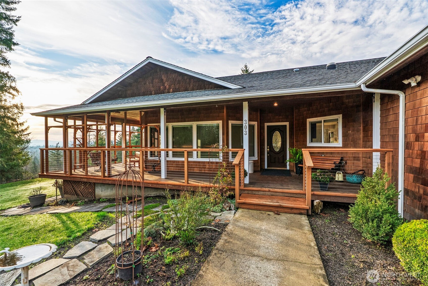 303 Shadow Mountain Road Silverlake, WA 98645 - Photo 5 of 39 a front view of a house with garden