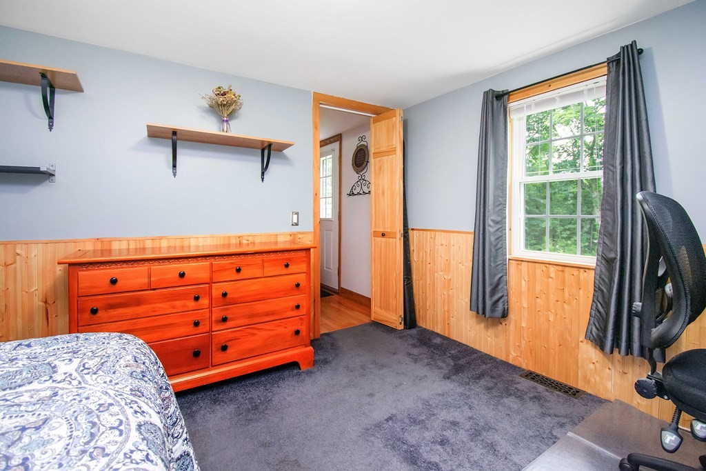 130 Warren Road Brimfield, MA 01010 - Photo 12 of 29 a bedroom with a bed and a dresser