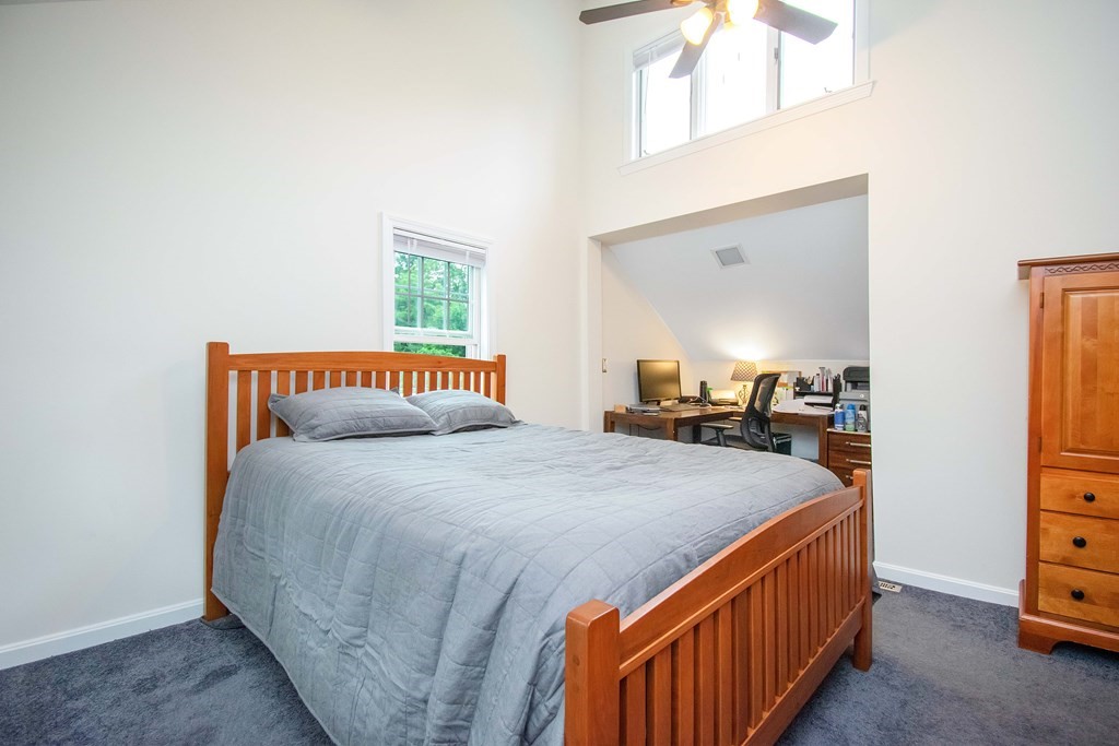 130 Warren Road Brimfield, MA 01010 - Photo 16 of 29 a bedroom with a bed and a dresser in it