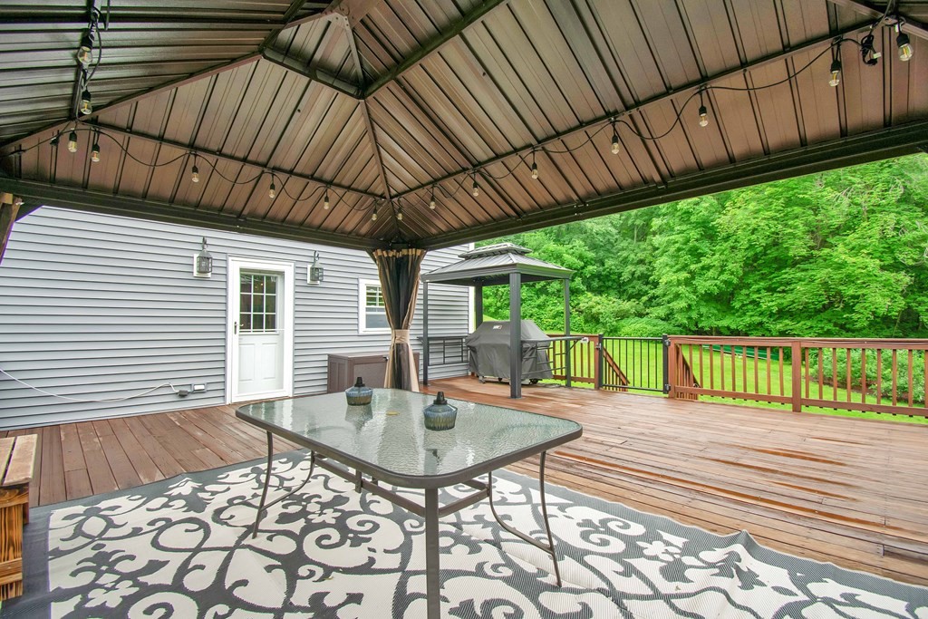 130 Warren Road Brimfield, MA 01010 - Photo 23 of 29 a balcony view with a seating space