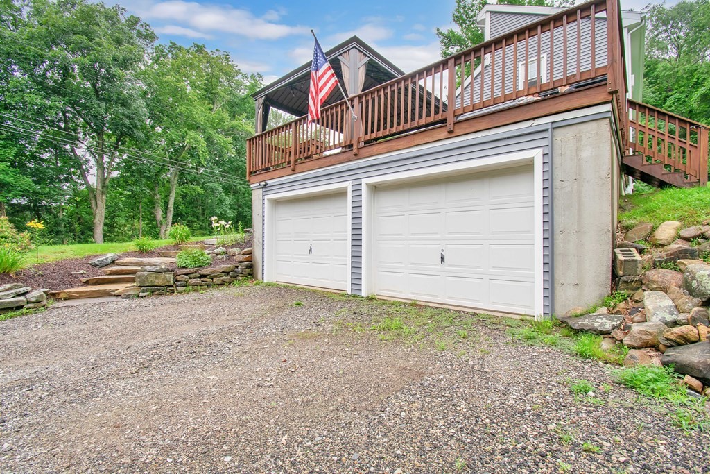 130 Warren Road Brimfield, MA 01010 - Photo 27 of 29 front view of a house with a street
