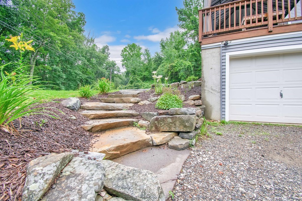 130 Warren Road Brimfield, MA 01010 - Photo 29 of 29 a backyard of a house with lots of green space