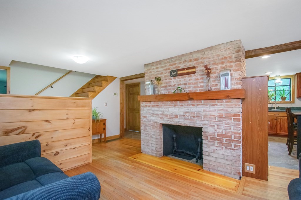 130 Warren Road Brimfield, MA 01010 - Photo 9 of 29 a view of livingroom with furniture and fireplace
