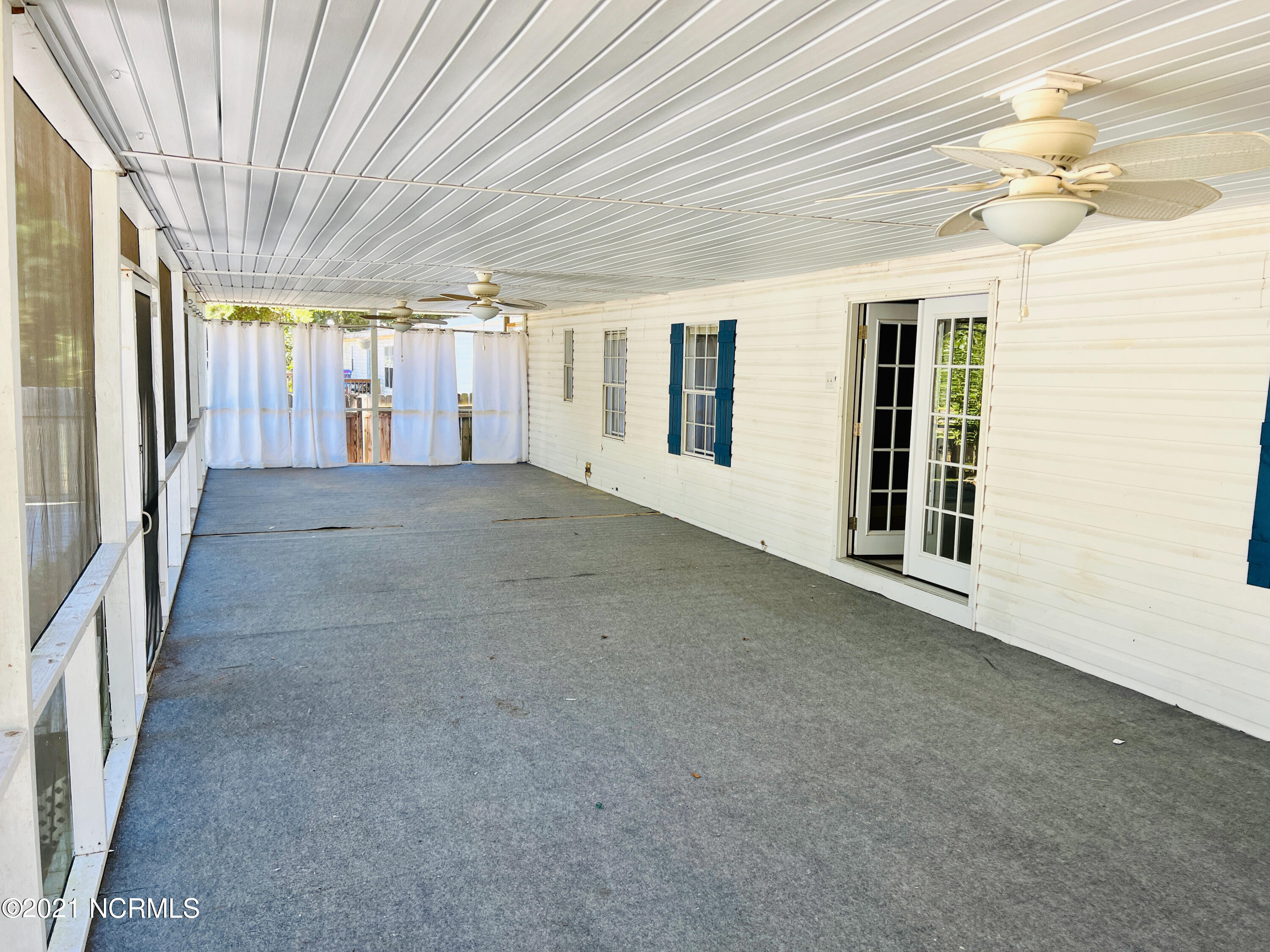 3151 Mobleys Bridge Road Grimesland, NC 27837 - Photo 18 of 21 Rear Screened Porch