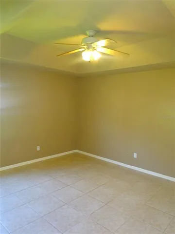 a bathroom with a sink mirror and a bathtub