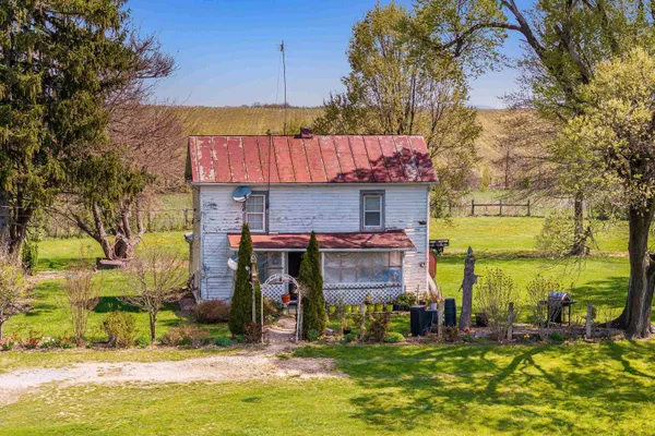 a view of a house with swimming pool