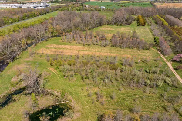 a aerial view of residential houses with outdoor space