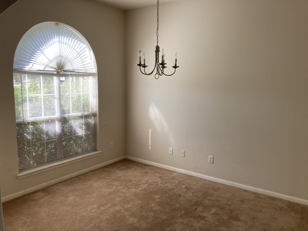 702 Silver Reef Lane La Marque, TX 77568 - Photo 2 of 9 an empty room with a window