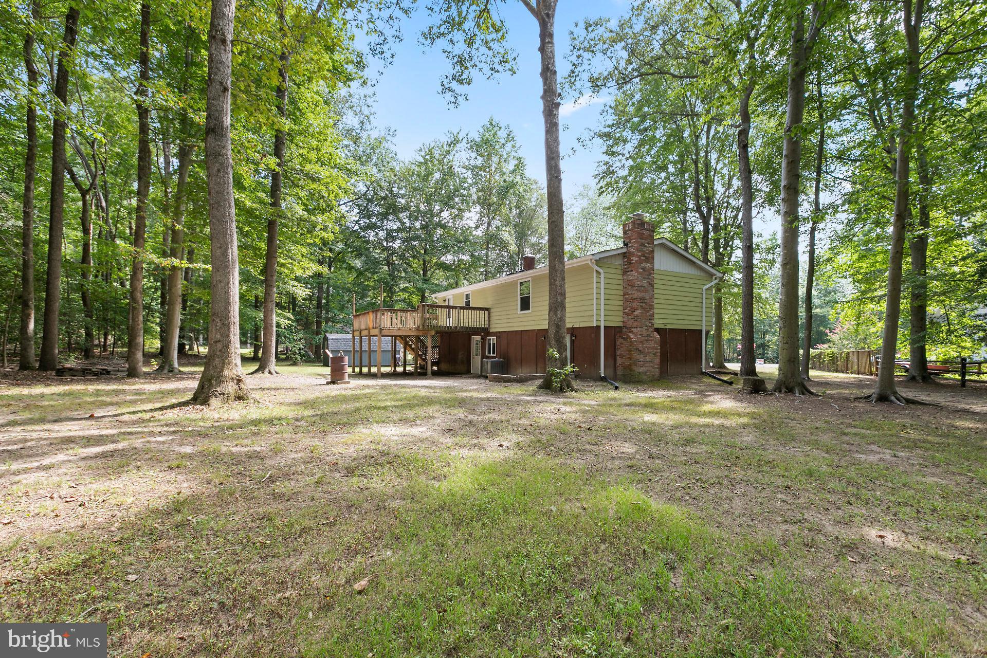 11601 Jester Way Dunkirk, MD 20754 - Photo 3 of 24 a house with trees in the background