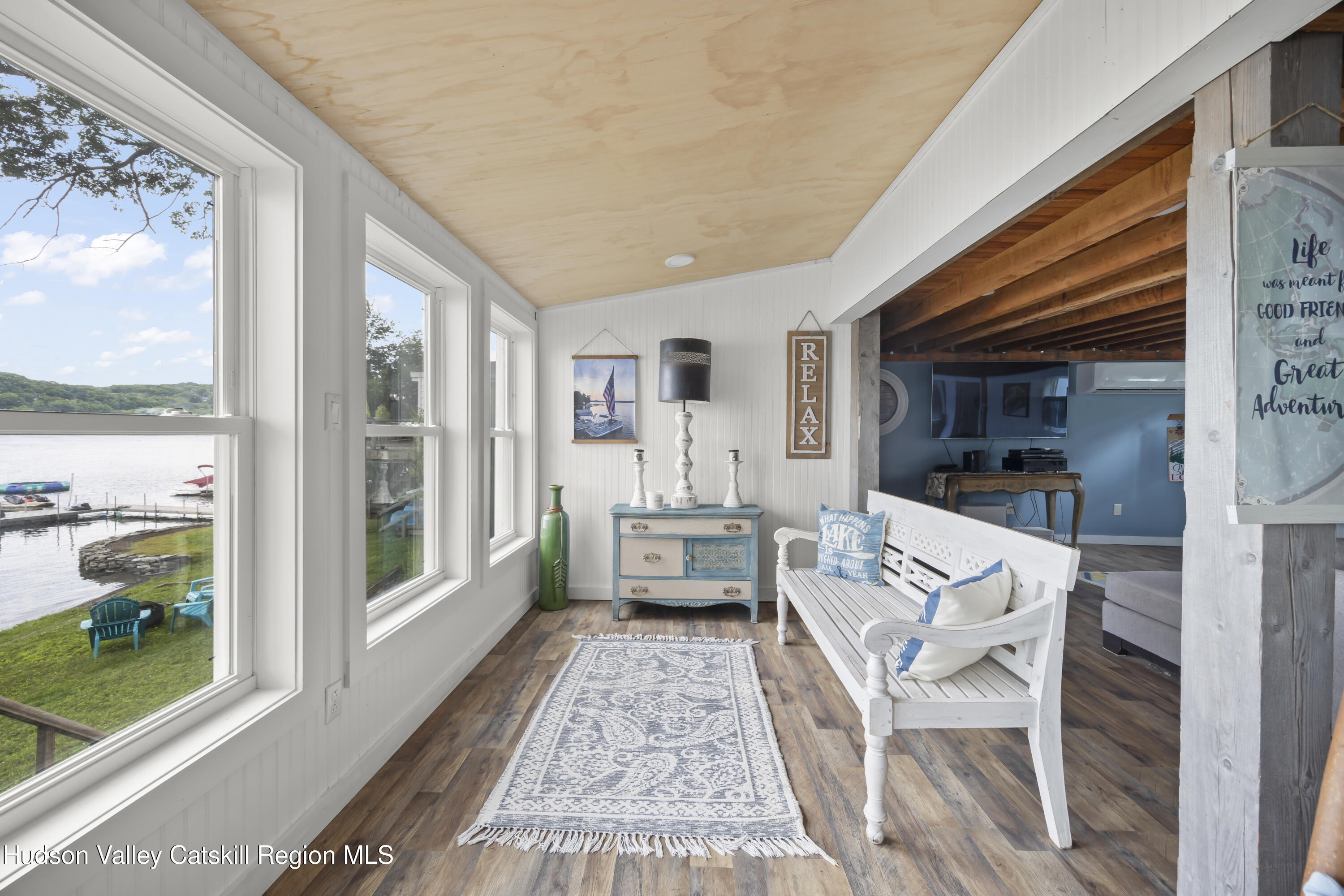 44 Southwest Colony Road Hillsdale, NY 12529 - Photo 24 of 40 a living room with furniture and a large window