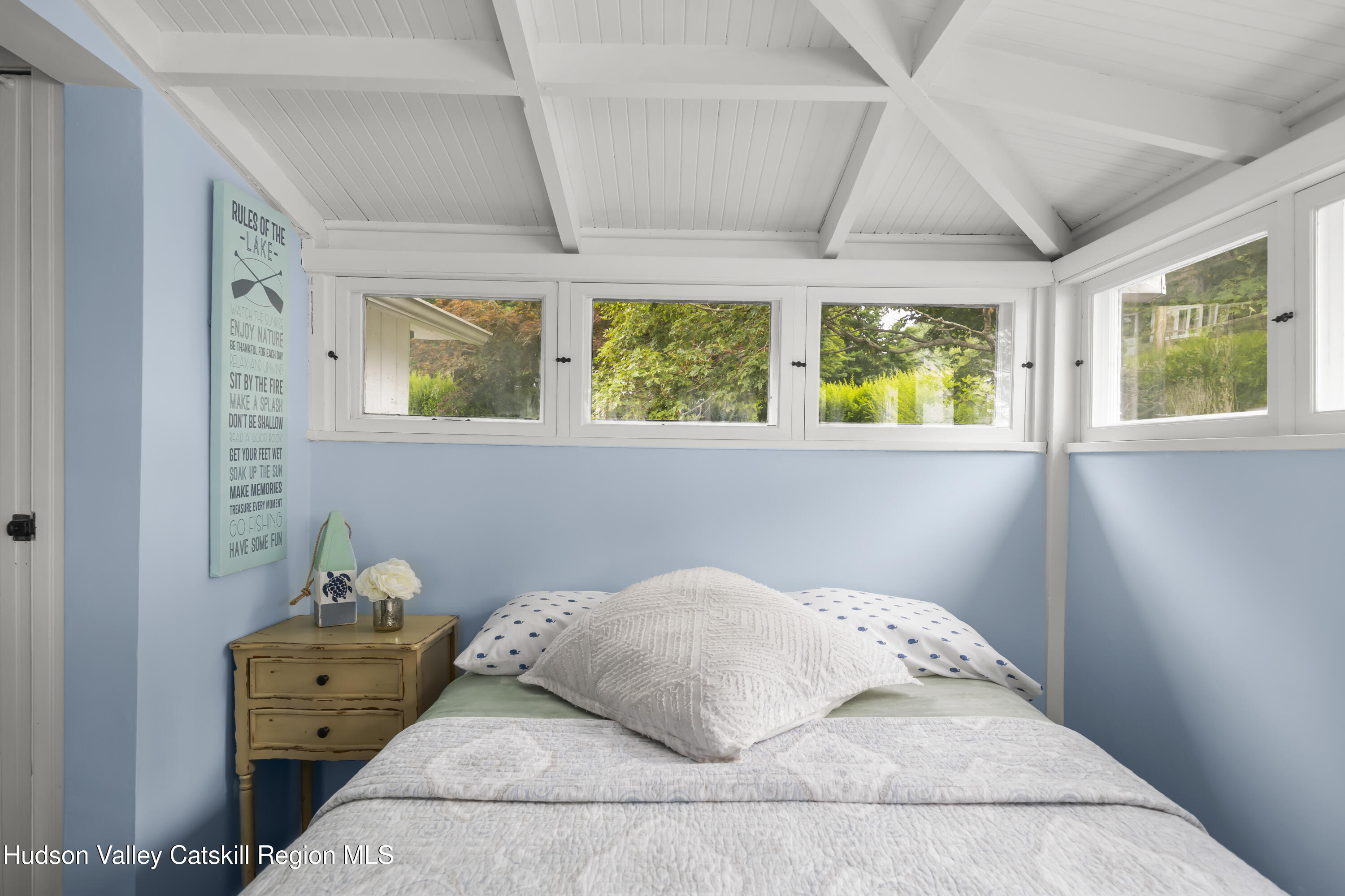 44 Southwest Colony Road Hillsdale, NY 12529 - Photo 35 of 40 a bedroom with a bed and wooden floor