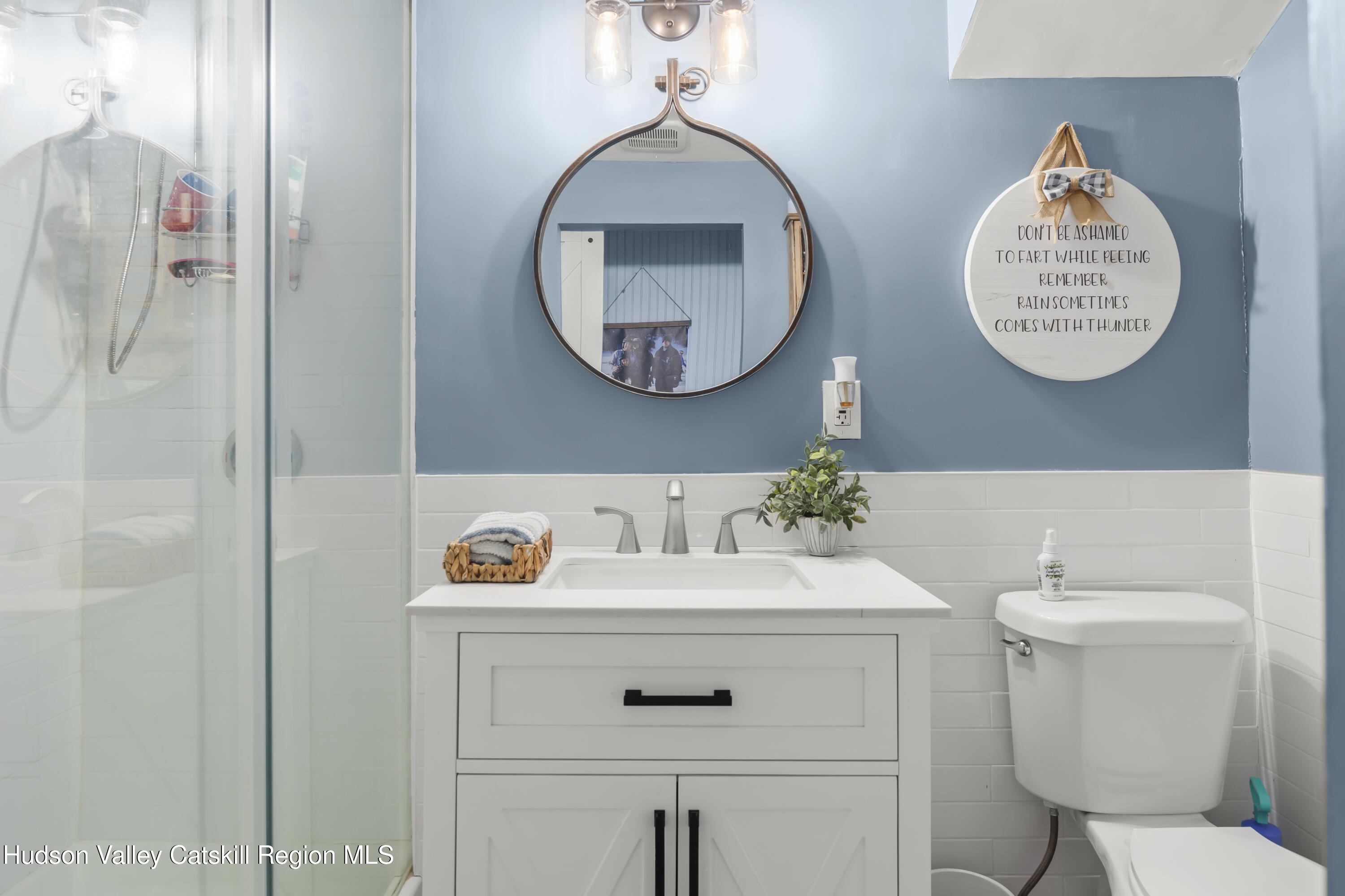 44 Southwest Colony Road Hillsdale, NY 12529 - Photo 36 of 40 a bathroom with a sink mirror and toilet